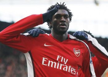 Emmanuel Adebayor celebrating a goal in Arsenal's colour