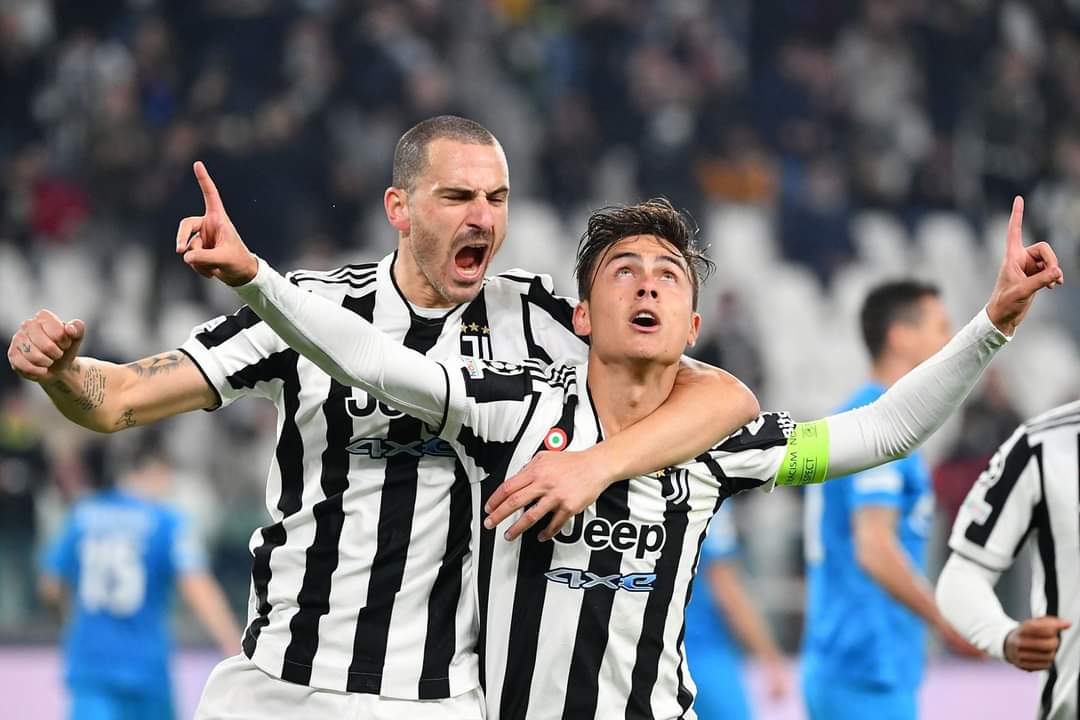 Dybala celebrates after sending Juve to the Champions League knockout stage