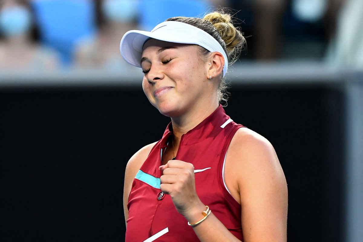 Amanda Anisimova celebrates victory over Naomi Osaka at the Australian Open