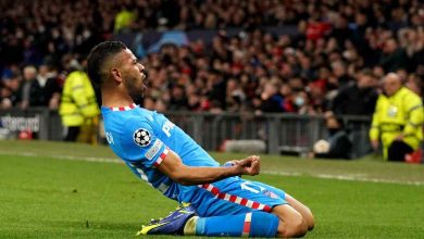 Renan Lodi celebrates after scoring the winner for Atletico Madrid