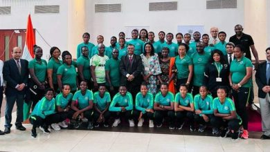 His Excellency Gangaharan Balasubramanian with players and officials of Flamingos on Thursday.