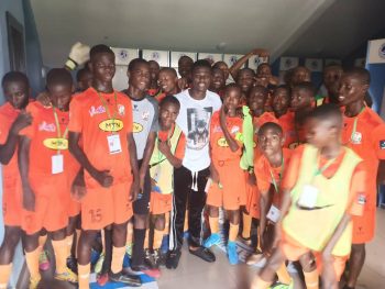 Edidiong Ezekiel and Dakkada FC U-15 players