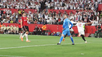 Sevilla stars Lamela and En-Nesyri celebrate their opener against Manchester United