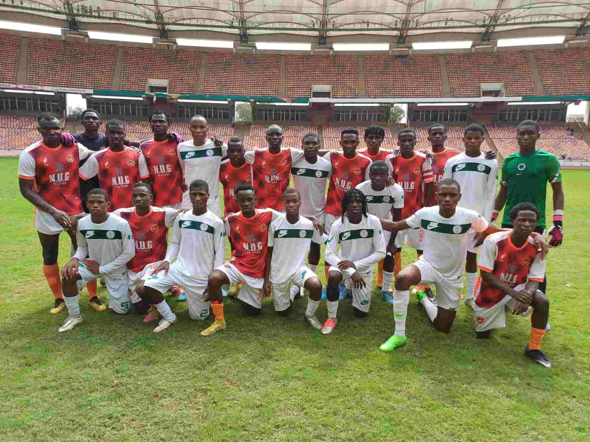 Golden Eaglets and Pride FC players after the Friendly game on Saturday