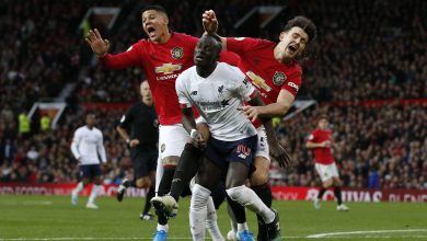 Marcos Rojo and Harry Maguire in action for Manchester United