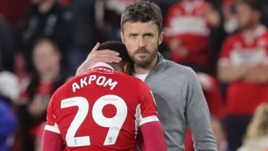 Micheal Carrick consoles Akpom after EFL Championship playoff loss