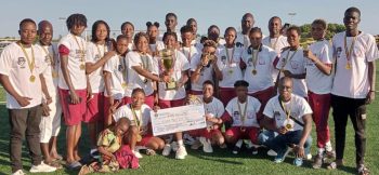 Anams Lillian with the Benin Republic Women's League title won by her club Sam Nelly FC