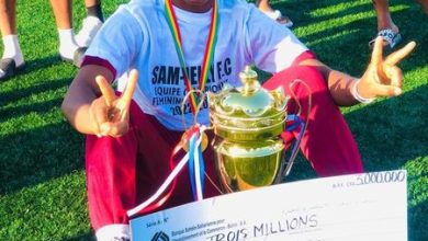 Anam Nelly with the Benin Republic Women's League title won by her club Sam Nelly FC