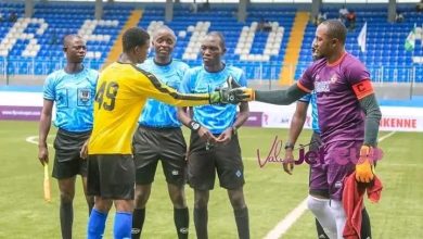 FATHER BEHOLD YOUR SON; Dele Aiyenugba exchanging banters with his son before the ValueJet pre-season tournament semi-final.