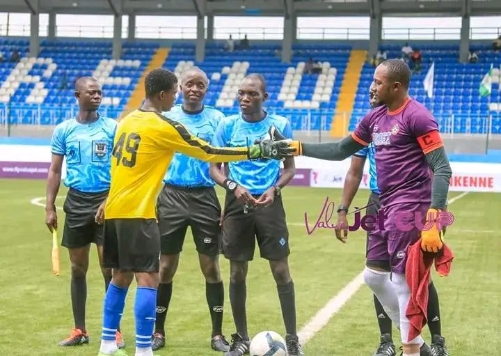 FATHER BEHOLD YOUR SON; Dele Aiyenugba exchanging banters with his son before the ValueJet pre-season tournament semi-final.