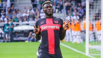 Victor Boniface celebrates a goal for Bayer Leverkusen.