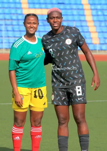 Ethiopia Women's National team skipper Lorza Aberra and Super Falcons star, Asisat Oshoala after the Olympics qualification game in Addis Ababa.