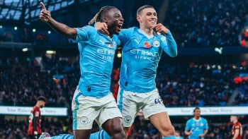 Jeremy Doku and Phil Foden celebrate after the Englishman scored City's 5th goal in the 6-1 spanking of Bournemouth 