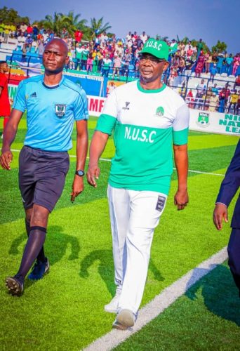 Nasarawa State Governor Abdullahi Sule walking off the Lafia City Stadium pitch after taking the ceremonial kickoff