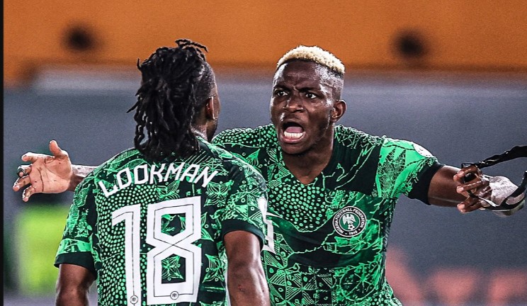 Osimhen celebrates with Ademola Lookman after the first Nigeria goal vs Cameroon