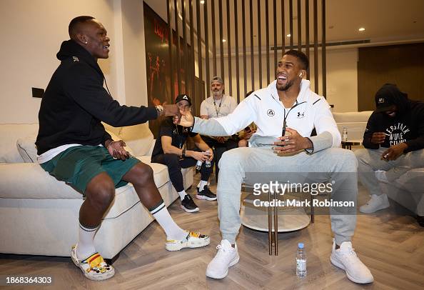 Anthony Joshua and Israel Adesanya