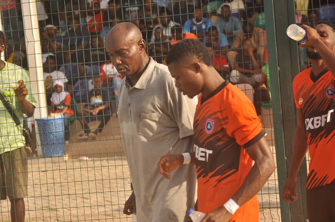 Akwa United striker Edidiong Ezekiel and Coach Baba Ganaru during their Federation Cup Round of 32 game