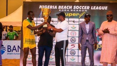 Otuekong Nse Essien presents Nigeria Beach Soccerleague title to Kebbi Fishers