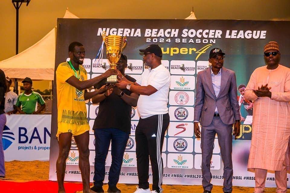 Otuekong Nse Essien presents Nigeria Beach Soccerleague title to Kebbi Fishers