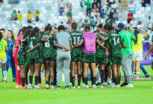 Super Falcons of Nigeria praying after the match against Brazil