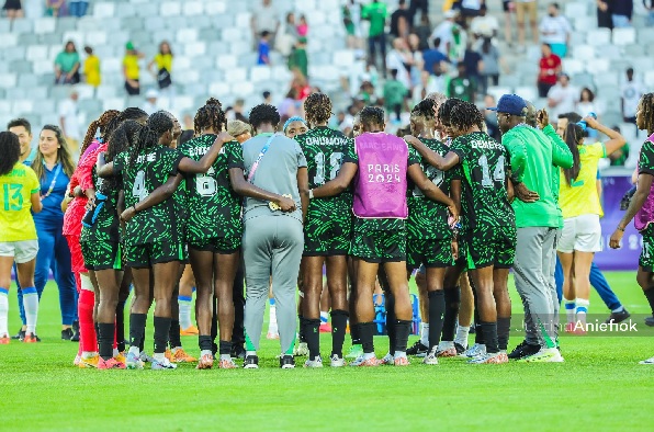 Super Falcons of Nigeria praying after the match against Brazil