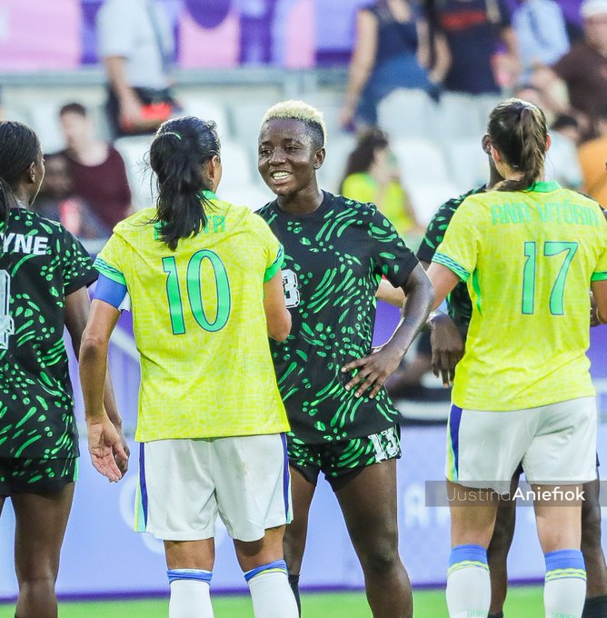 Deborah Abiodun met Brazil legend Martha after the game