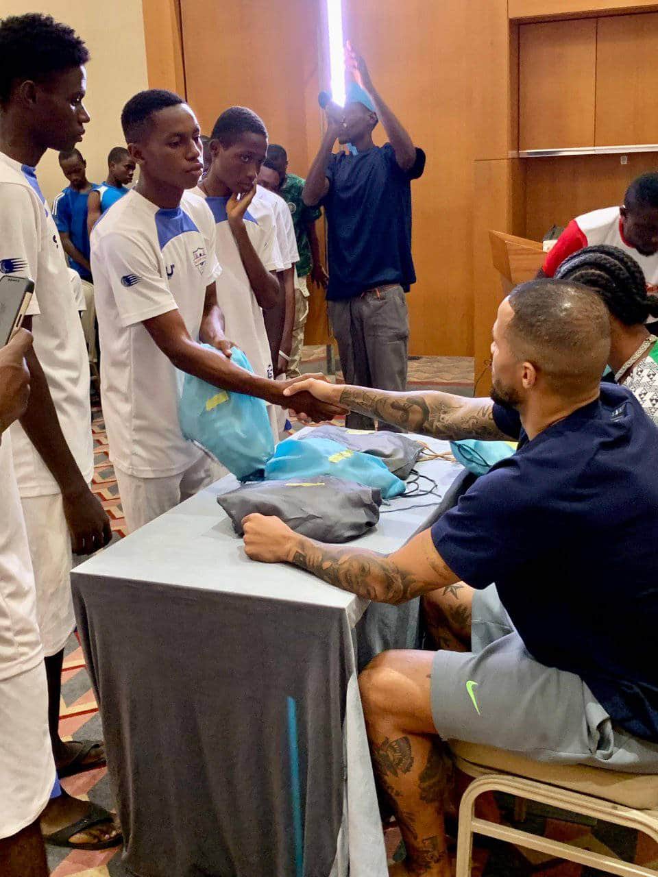 Super Eagles Captain Troost-Ekong and Actor Natse Jemide Surprise Blessed Stars Academy Players with Memorable Gifts