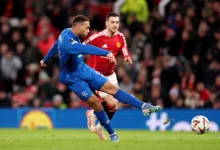 cyriel dessers scores against Manchester united