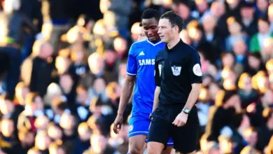 Mark Clattenburg and Mikel Obi