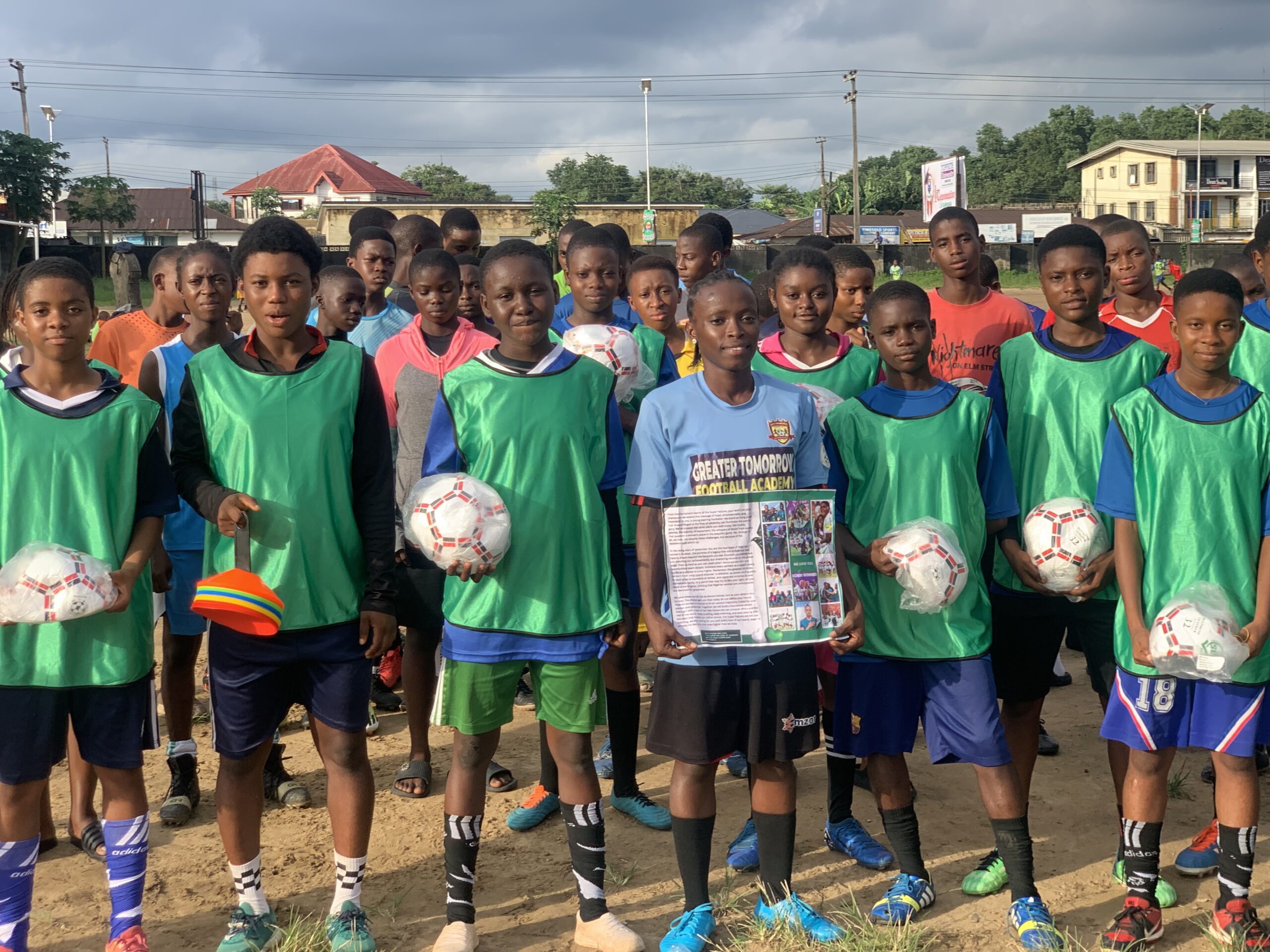 Super falcons send gift to Greater Tomorrow Academy