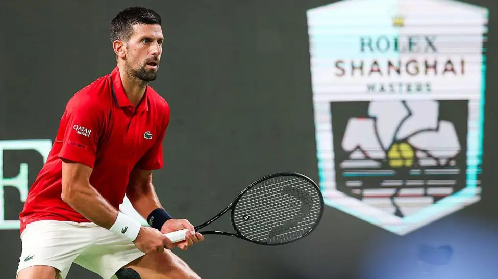 Novak Djokovic said he was just “trying to stay alive” as he fought through very tough weather to reach the semi-finals of the Shanghai Masters.