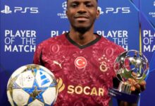 Victor Osimhen holds the match ball and Player of the Match award after scoring a hat-trick for Galatasaray against Ajax in the 2025 UEFA Champions League