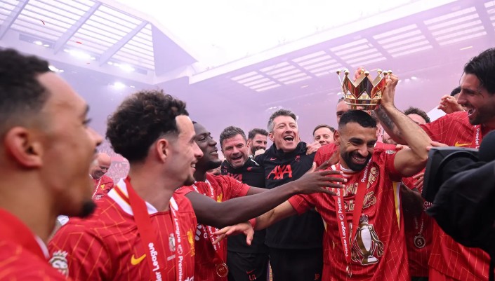 Mohamed Salah celebrating Liverpool’s Premier League title with teammates at Anfield