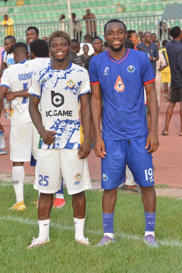 Blessed Stars Football Academy graduates Yahaya Ibrahim (White) and Peter Ita (Blue) at the Kwara United vs Warri Wolves NPFL match